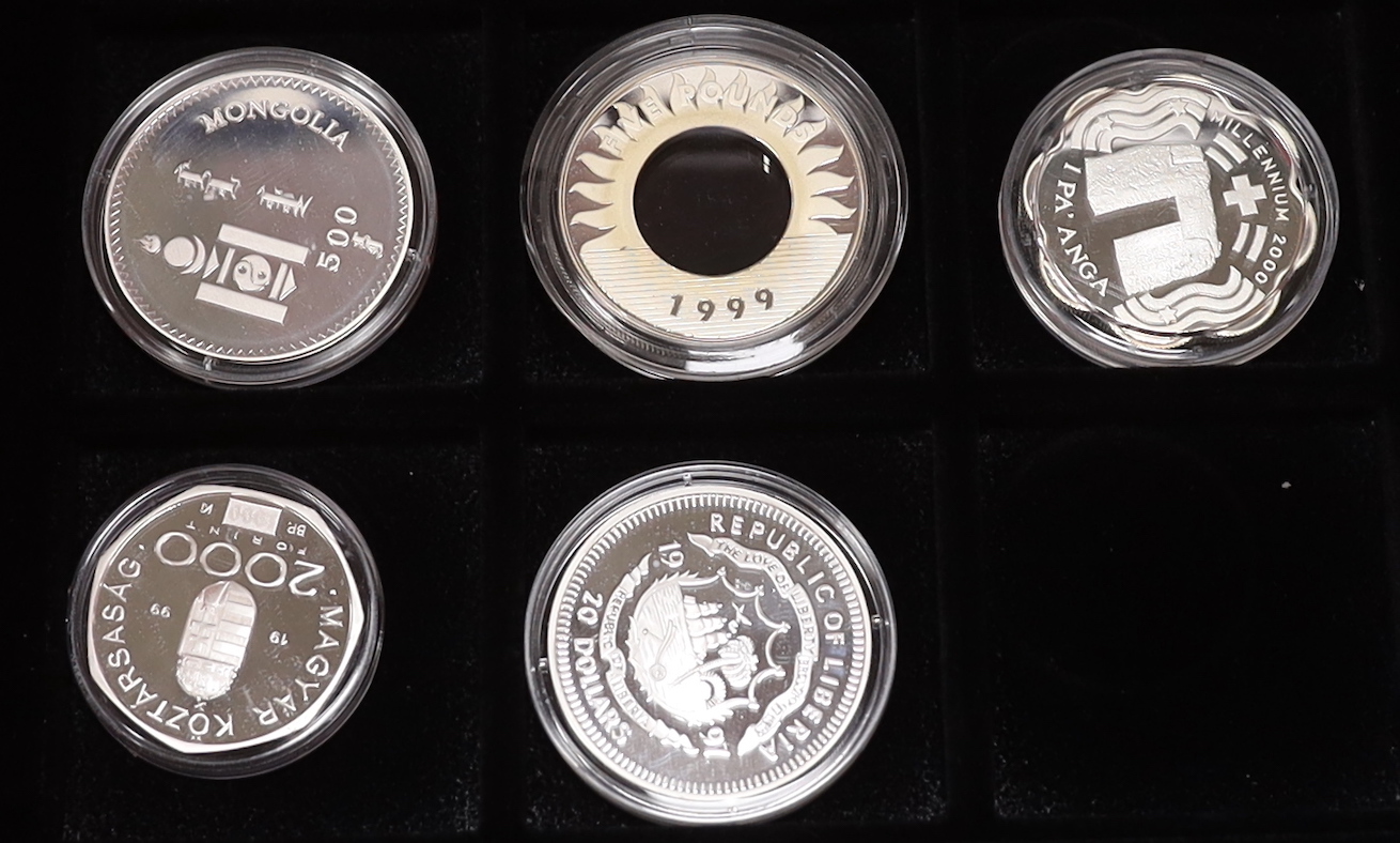 QEII and U.S. and World commemorative proof silver coins to include- 1997 Bermuda Triangle a $3 coin Kiribati coins, Republic of Malawi, Vanuatu, Mongolia, Mexico, Hungary, kingdom of Tonga, Guernsey, Guyana millennium $